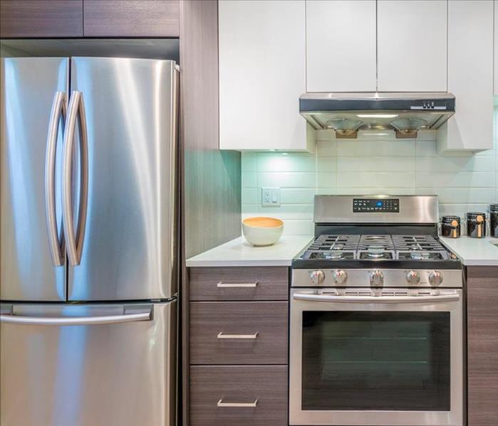 Stainless Steel appliances in a kitchen.